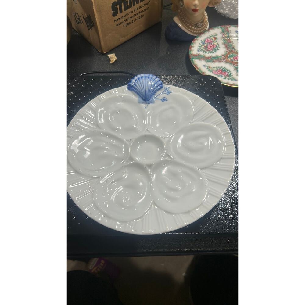 white artland porcelain oyster plate with six wells for oysters